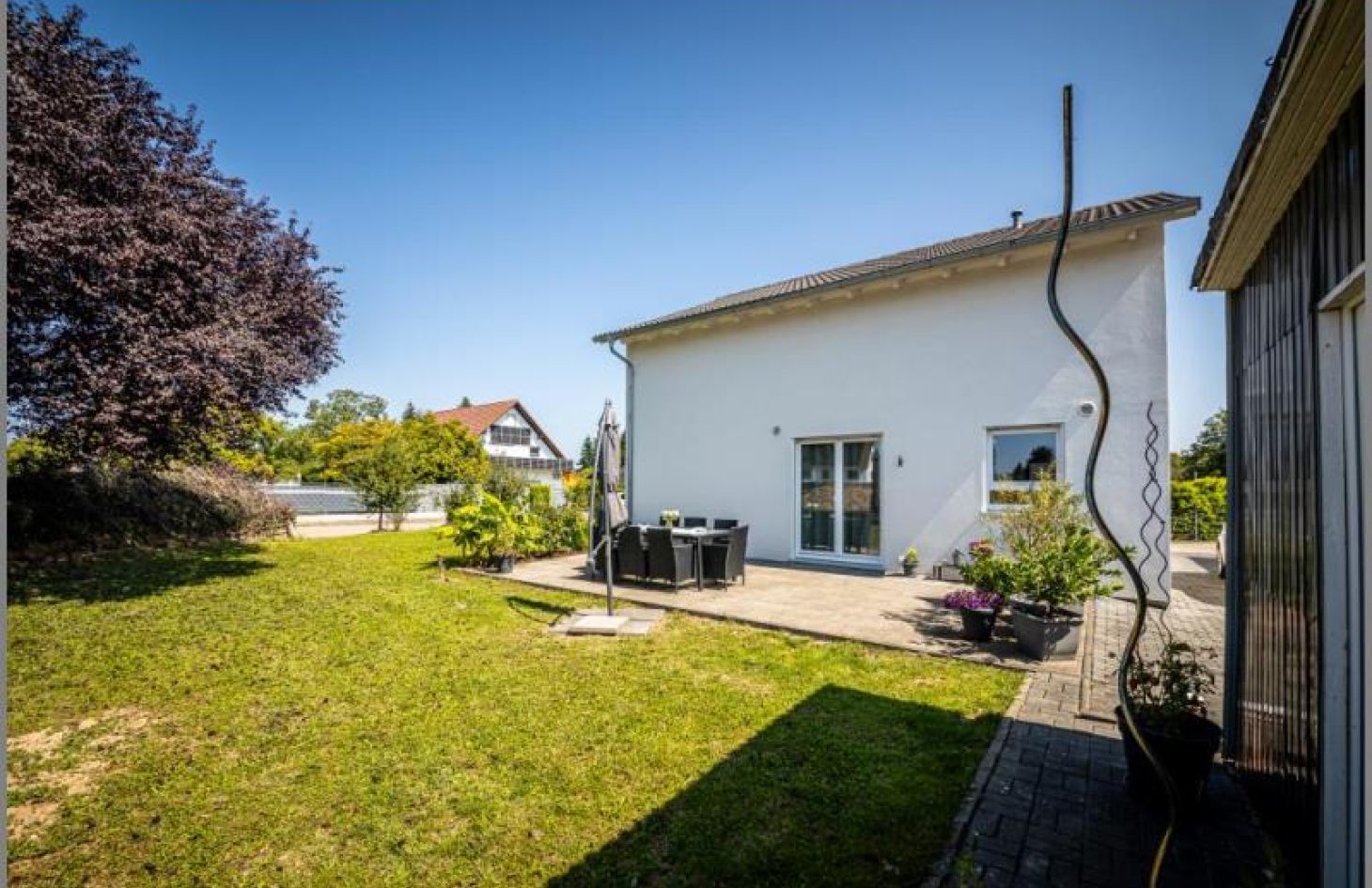Terrasse / Westansicht von Modernes Einfamilienhaus 2016 mit 4 Schlafzimmern und tollem Grundstück in Rheinau-Rheinbischofsheim bei Dhonau Immobilien-Makler Ortenau