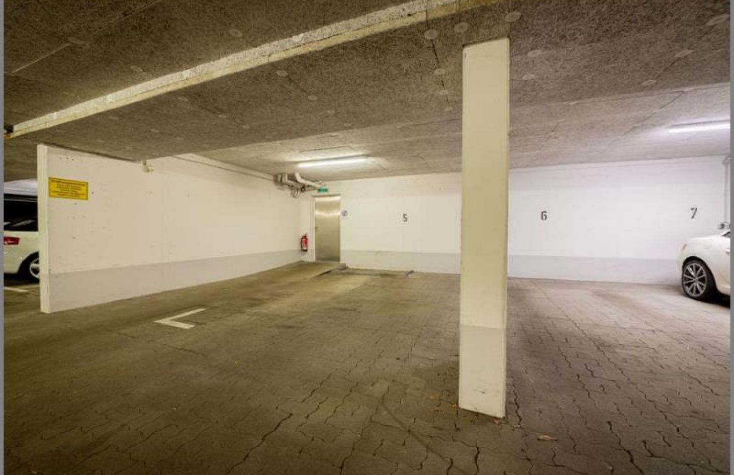 2 TG-Stellplätze (1 XL-Platz) von Genial! Schicke 3-Zimmer-Stadtwohnung im EG mit großem Garten, Tiefgarage, Aufzug in Achern Stadt bei Dhonau Immobilien-Makler Ortenau