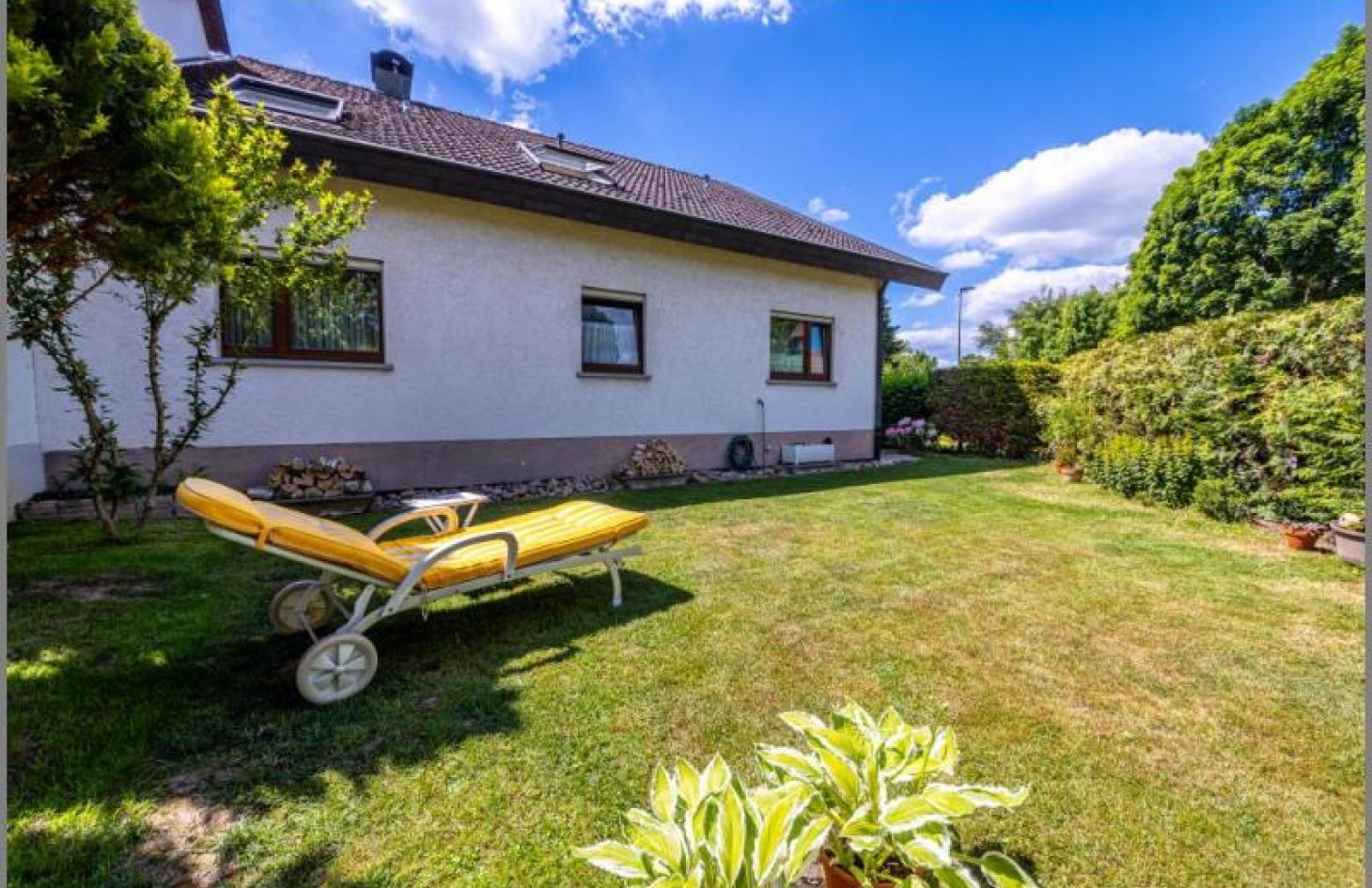 Gartenanteil mit Kellerzugang von Sehr schöne DG-Eigentumswohnung mit Kamin, Loggia, Garten, Garage in Achern bei Dhonau Immobilien-Makler Ortenau