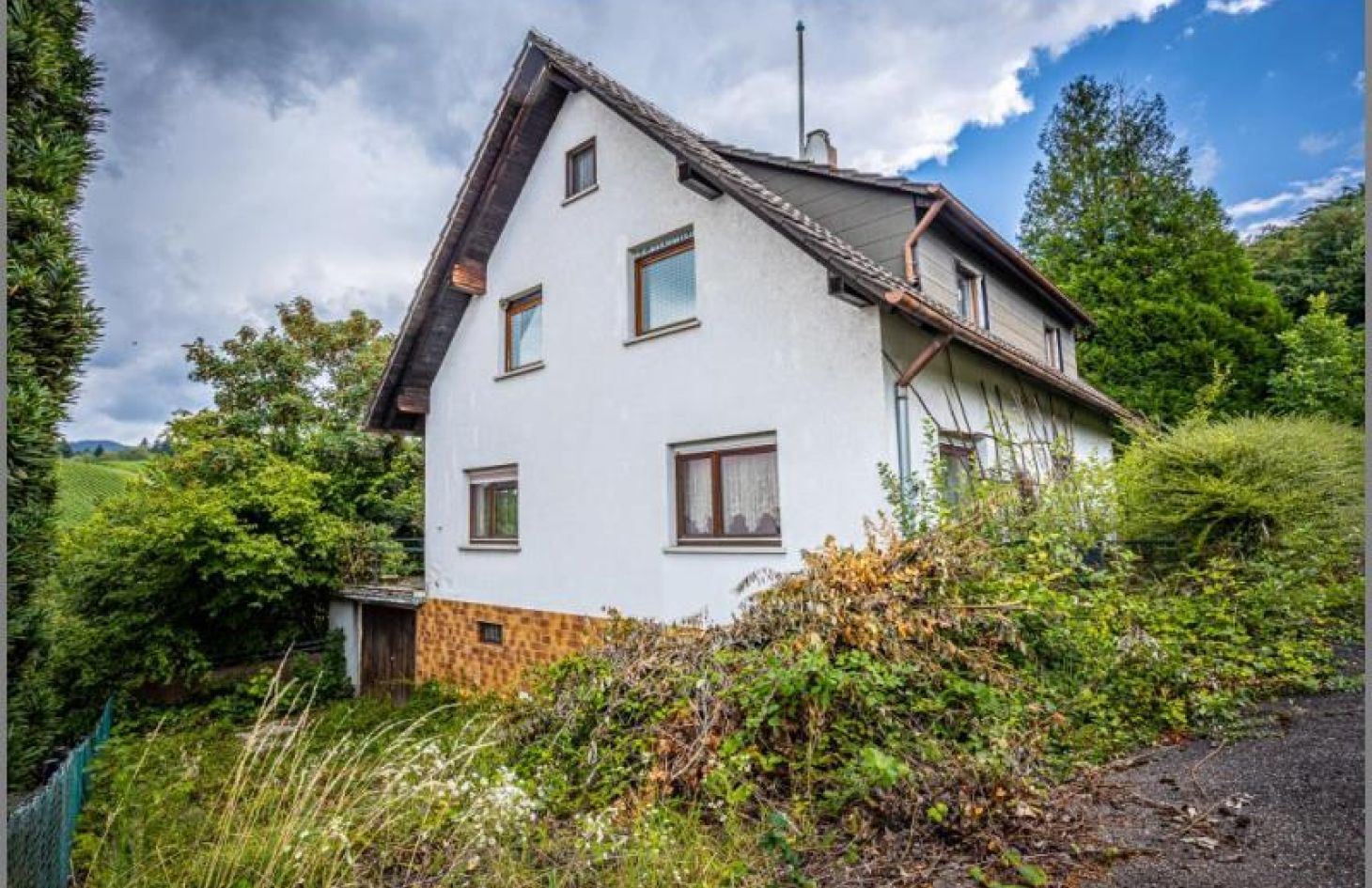 Westansicht von Ihre Sanierungs-Chance: EFH oder ZFH mit großem Grundstück in ruhiger Lage in Lauf bei Dhonau Immobilien-Makler Ortenau